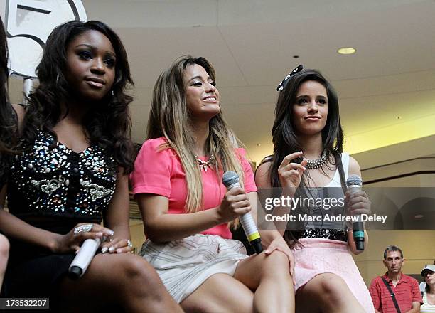 Normani Hamilton, Ally Brooke and Camila Cabello of Fifth Harmony at the Square One Mall on July 15, 2013 in Saugus, Massachusetts.