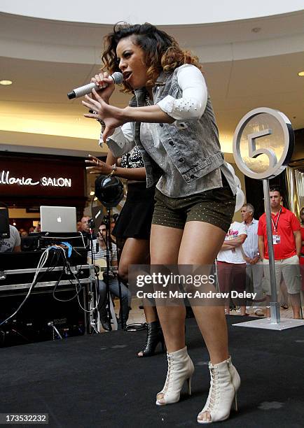 Dinah-Jane Hansen of Fifth Harmony performs at the Square One Mall on July 15, 2013 in Saugus, Massachusetts.
