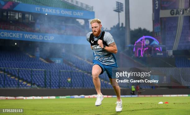 Ben Stokes of England takes part in a fitness drill during a nets session at Arun Jaitley Stadium on October 14, 2023 in Delhi, India.