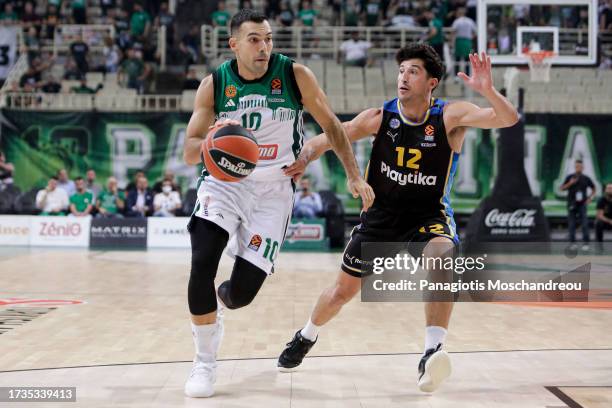 Kostas Sloukas, #10 of Panathinaikos Athens competes with John DiBartolomeo, #12 of Maccabi Playtika Tel Aviv during the Turkish Airlines EuroLeague...