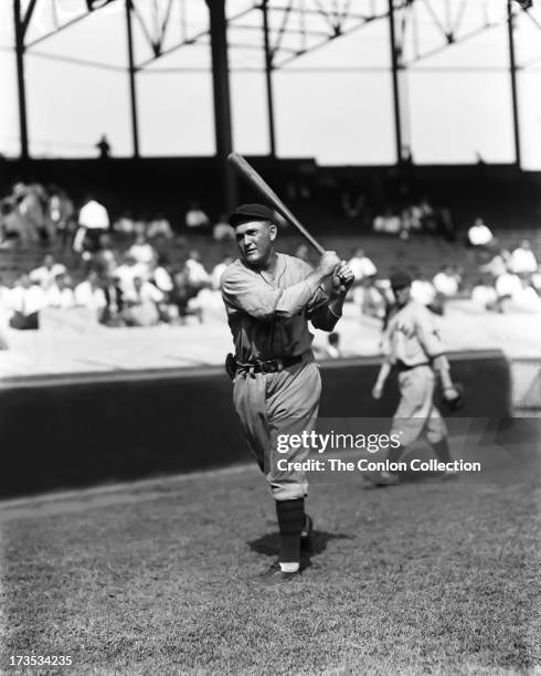 Rogers Hornsby of the Chicago Cubs swinging a bat in 1930.