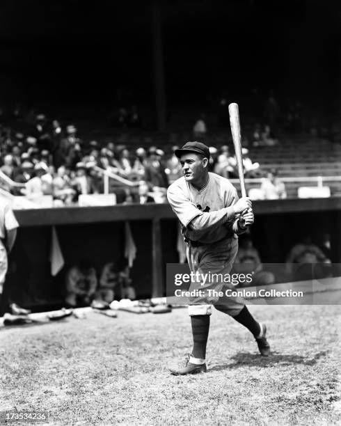 Rogers Hornsby of the Chicago Cubs swinging a bat in 1929.
