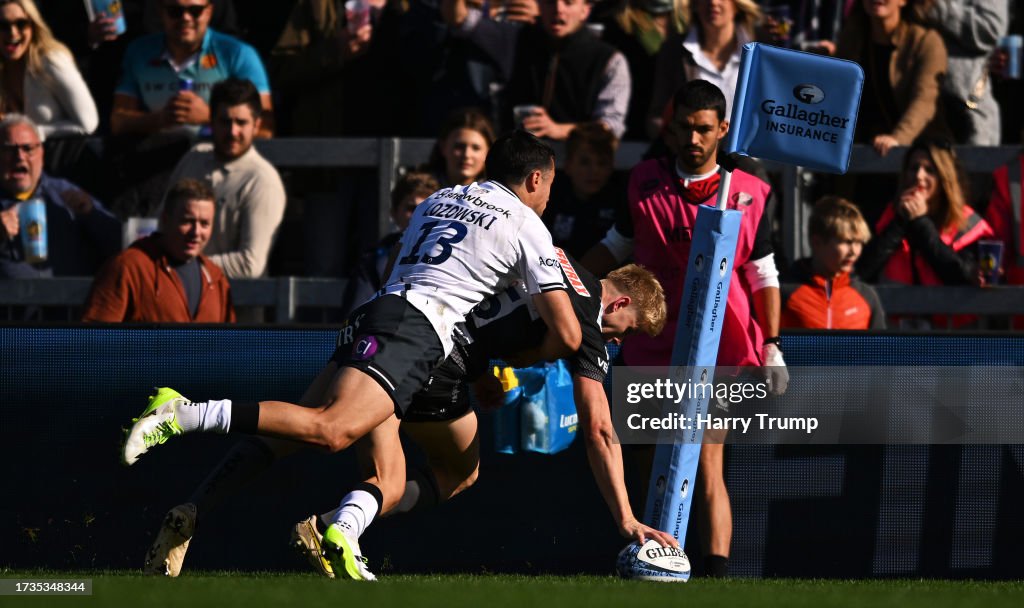Exeter Rugby Colours Josh Hodge of Exeter Chiefs goes over to score their sides seventh ...