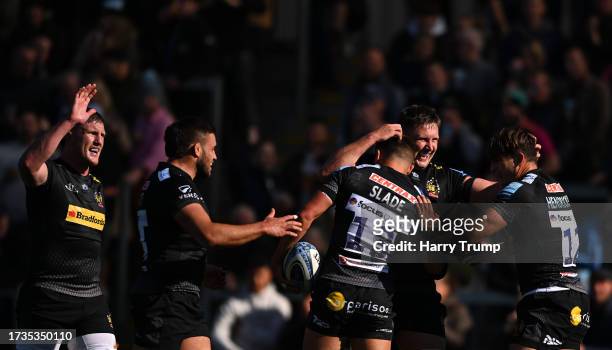 Henry Slade of Exeter Chiefs celebrates their sides sixth try during the Gallagher Premiership Rugby match between Exeter Chiefs and Saracens at...