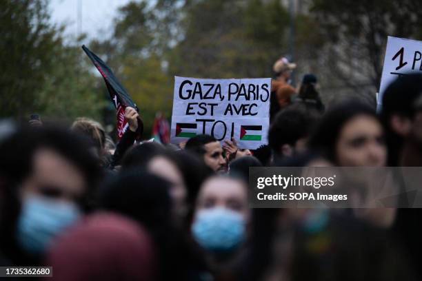 Gaza, Paris stands with you' placard seen during the Pro-Palestine demonstration. Thousands of people gathered again at Place de la Republique in...