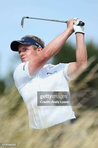 Luke Donald of England hits a shot ahead of the 142nd Open Championship at Muirfield on July 16, 2013 in Gullane, Scotland.