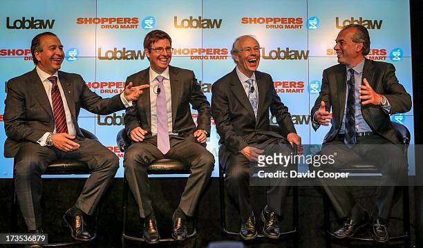 Press conference to announce that Loblaw Companies Limited is to acquire Shoppers Drug Mart Corporation for $12.4 billion in cash and stock. L-R in...
