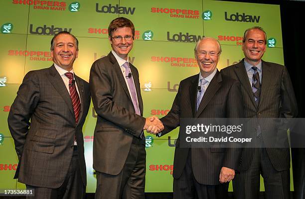 Press conference to announce that Loblaw Companies Limited is to acquire Shoppers Drug Mart Corporation for $12.4 billion in cash and stock. L-R in...