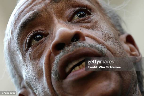 Rev. Al Sharpton, president of the National Action Network, speaks during a news conference outside the Department of Justice while discussing...