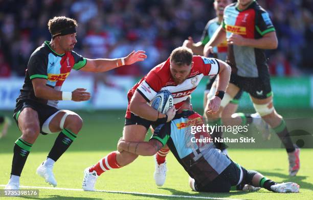 Harry Elrington of Gloucester is tackled by Tyrone Green of Harlequins during the Gallagher Premiership Rugby match between Gloucester Rugby and...