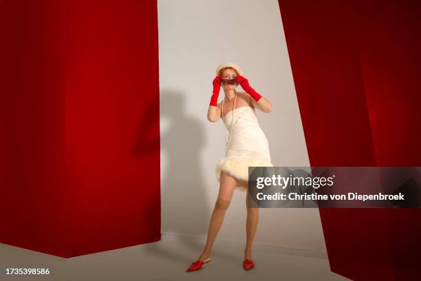 crazy young lady in modern surrounding - kuriose mode stock-fotos und bilder