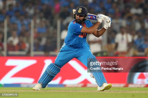 Rohit Sharma of India hits a four during the ICC Men's Cricket World Cup India 2023 between India and Pakistan at Narendra Modi Stadium on October...