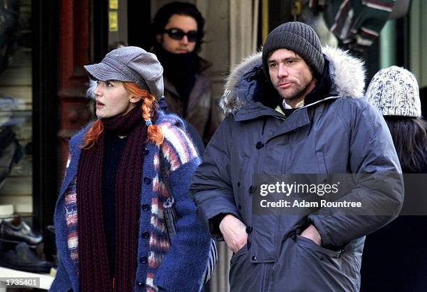 Actor Jim Carrey and actress Kate Winslet stand on the movie set of "Eternal Sunshine of the Spotless Mind" January 20, 2003 in New York City.