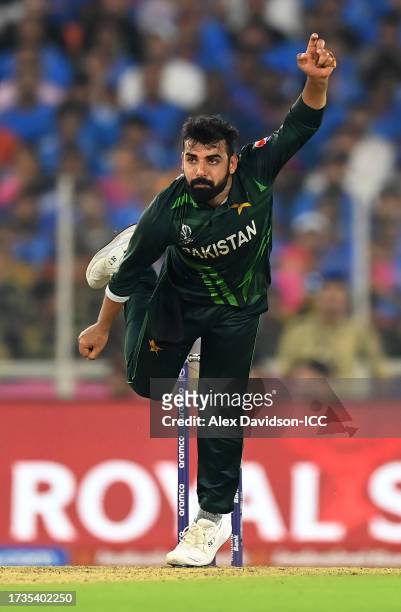 Shadab Khan of Pakistan bowls during the ICC Men's Cricket World Cup India 2023 between India and Pakistan at Narendra Modi Stadium on October 14,...