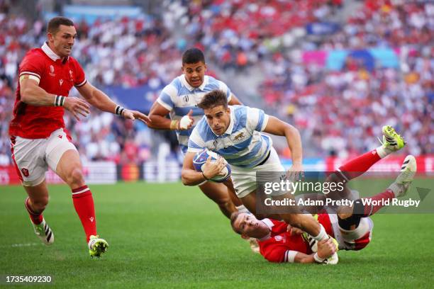 Juan Cruz Mallia of Argentina is tackled by Liam Williams of Wales during the Rugby World Cup France 2023 Quarter Final match between Wales and...