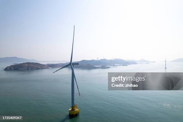 wind turbines at sea - sea islands stock pictures, royalty-free photos & images