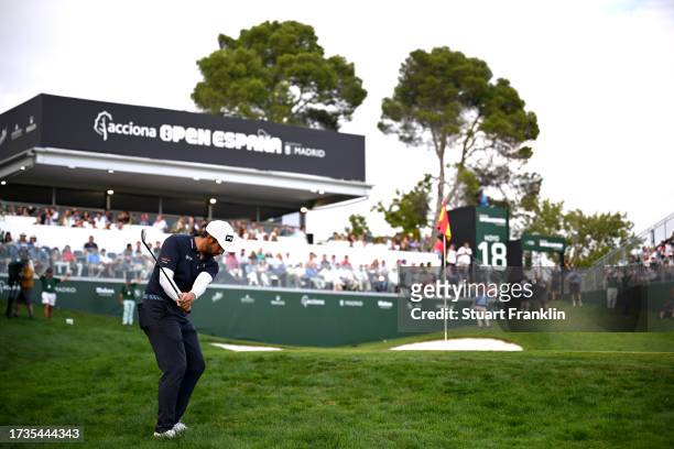Matthieu Pavon of France plays onto the 18th green on Day Three of the acciona Open de Espana presented by Madrid at Club de Campo Villa de Madrid on...