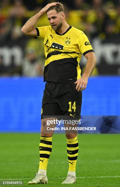 Dortmund's German forward Niclas Fuellkrug seen to be wearing the shin pads from his former club and tonight's opposition Werder Bremen during the...