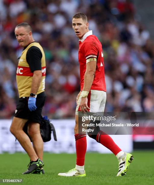 Liam Williams of Wales leaves the field having suffered an injury during the Rugby World Cup France 2023 Quarter Final match between Wales and...