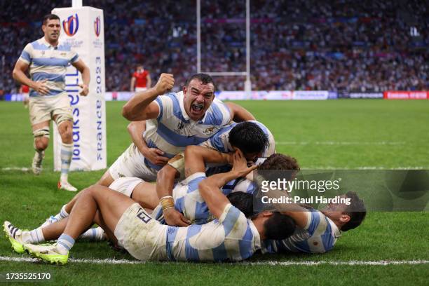 Nicolas Sanchez of Argentina celebrates with teammates after scoring the team's second try during the Rugby World Cup France 2023 Quarter Final match...