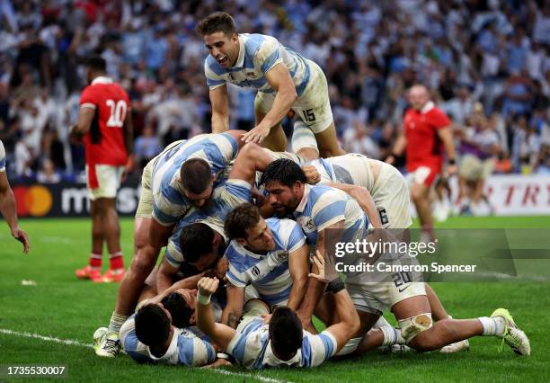 Nicolas Sanchez of Argentina celebrates with teammates after scoring his team's second try during the Rugby World Cup France 2023 Quarter Final match...