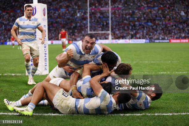 Nicolas Sanchez of Argentina celebrates with teammates after scoring the team's second try during the Rugby World Cup France 2023 Quarter Final match...