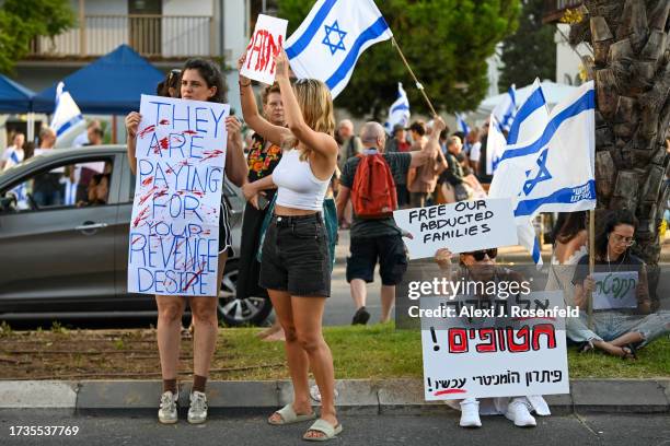 People protest outside The Kirya on October 14, 2023 in Tel Aviv, Israel. On October 7, the Palestinian militant group Hamas launched a surprise...