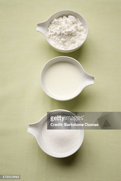 sugar, milk and flour - bowl of sugar stockfoto's en -beelden