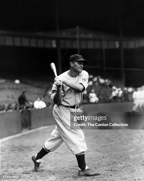 Henry E. Manush of the Washington Senators swinging a bat in 1934.