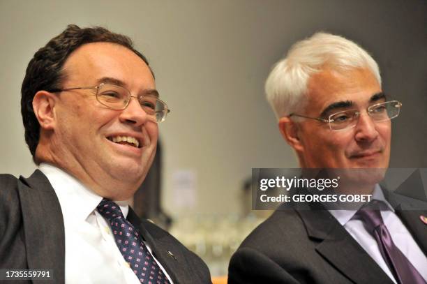 England National Bank executive director Andrew Bailey smiles with chancelor of the Exchequer Alistair Darling at the begining of the working session...