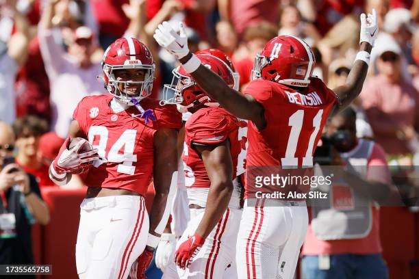 Amari Niblack of the Alabama Crimson Tide celebrates his touchdown with Jam Miller and Malik Benson during the second quarter against the Arkansas...