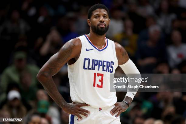 Paul George of the LA Clippers looks on during the first quarter \auof the Rain City Showcase in a preseason NBA game at Climate Pledge Arena on...