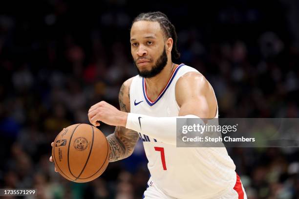 Amir Coffey of the LA Clippers dribbles against the Utah Jazz during the fourth quarter of the Rain City Showcase in a preseason NBA game at Climate...
