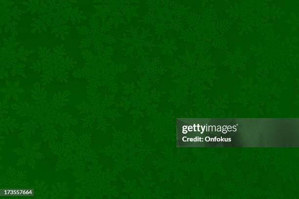 christmas paper texture background with green and white snowflakes - green christmas background stock pictures, royalty-free photos & images