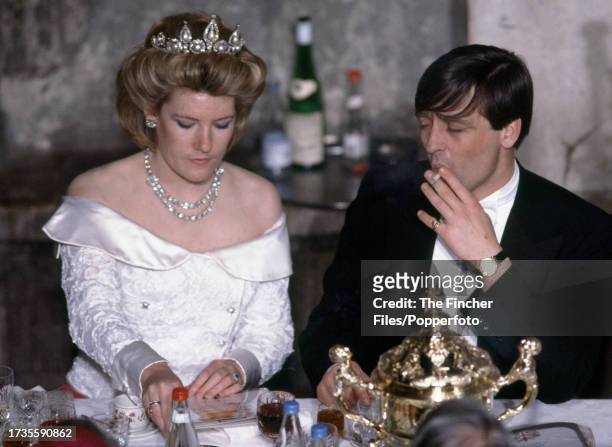 Gerald Grosvenor, The 6th Duke of Westminster , and his wife, Natalia Duchess of Westminster, smoking at a Guildhall banquet in London, circa 1985.