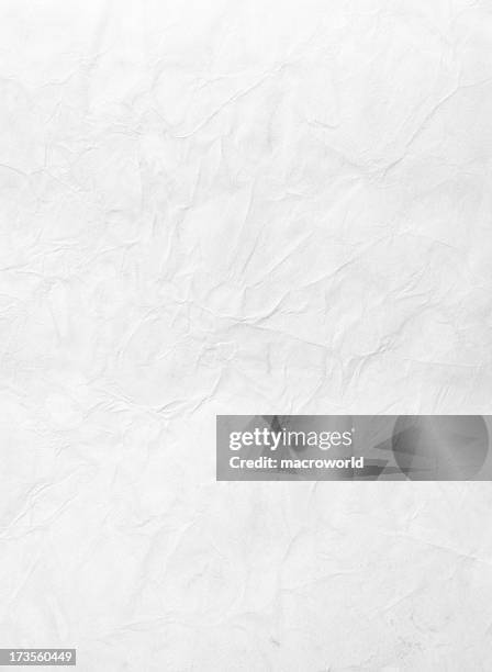 wrinkled piece of paper against a white background - old posters stock pictures, royalty-free photos & images