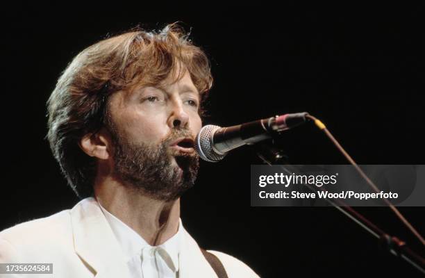 English musician Eric Clapton performing at Wembley Stadium on June 27, 1992 in London, England.