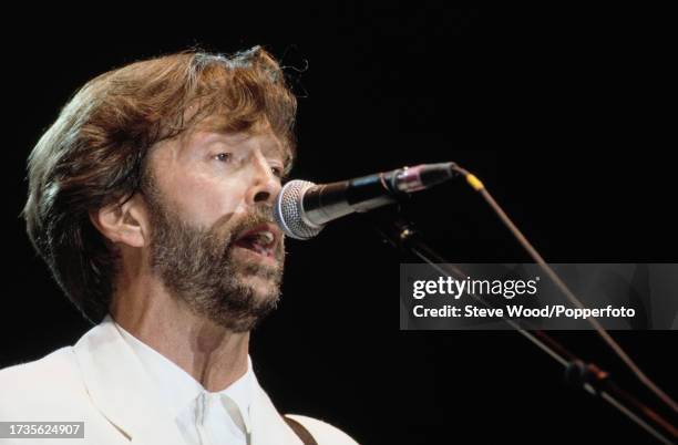 English musician Eric Clapton performing at Wembley Stadium on June 27, 1992 in London, England.