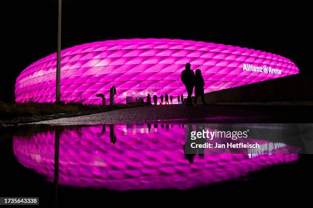The Allianz Arena stands lit pink during the Google Pixel Frauen-Bundesliga match between FC Bayern München and Eintracht Frankfurt to raise...