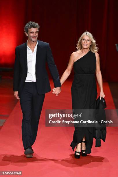 Manuel Herrero and Karin Viard attend the opening ceremony during the 15th Film Festival Lumiere on October 14, 2023 in Lyon, France.