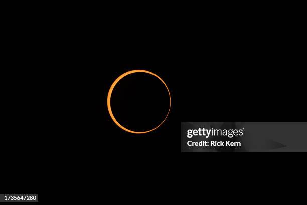 Rare "ring of fire" annular solar eclipse is seen on October 14, 2023 in Boerne, Texas. Differing from a total solar eclipse, the moon in an annular...