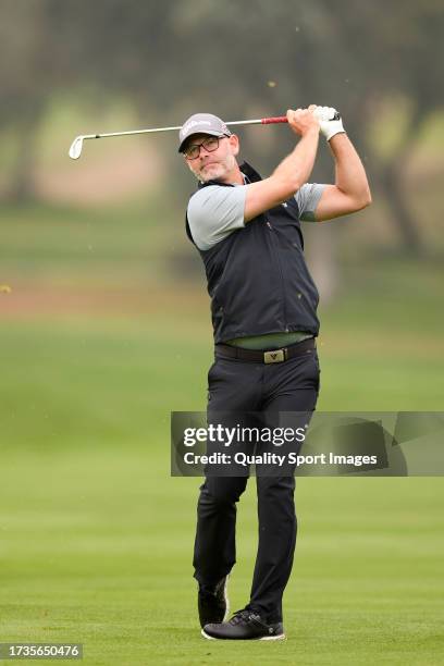 Paul Waring of England plays a shot on Day Three of the acciona Open de Espana presented by Madrid at Club de Campo Villa de Madrid on October 14,...