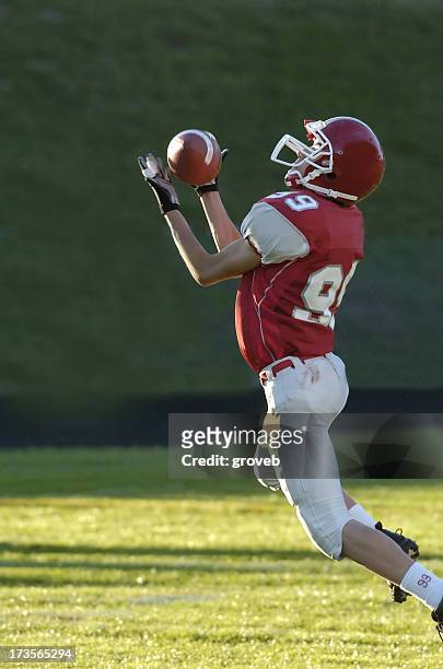 great catch, american high school football - touchdown catch stock pictures, royalty-free photos & images