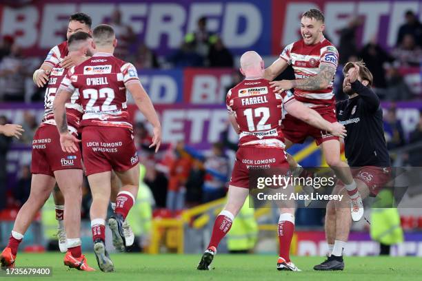 Sam Powell of Wigan Warriors celebrates with teammates after the team's victory during the Betfred Super League Final match between Wigan Warriors v...