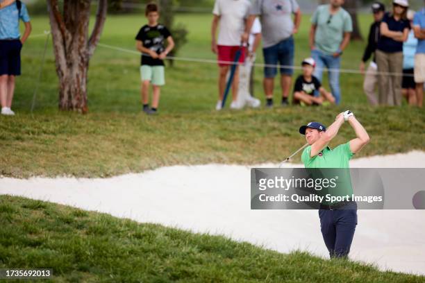 Wil Besseling of Netherlands plays his bunker shot on the 16th hole on Day Three of the acciona Open de Espana presented by Madrid at Club de Campo...