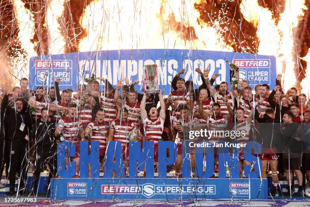 Liam Farrell of Wigan Warriors lifts Betfred Super League Grand Final trophy during the Betfred Super League Final match between Wigan Warriors v...