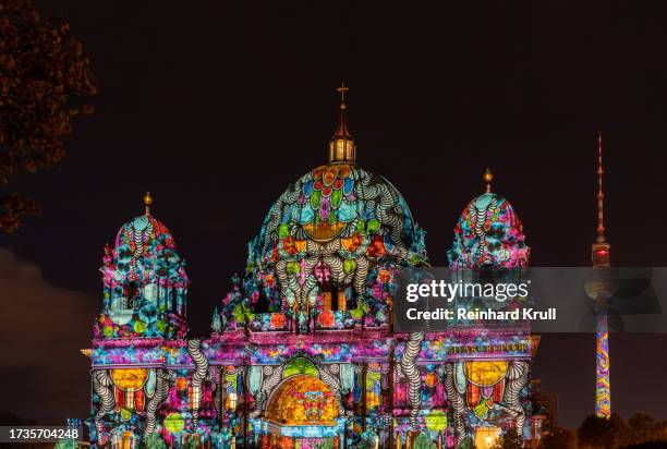 berlin cathedral and communications tower at festival of lights - berlin - berlin nightlife stock pictures, royalty-free photos & images