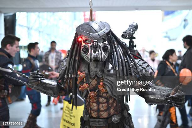 Cosplayer poses as The Predator during New York Comic Con 2023 - Day 3 at Javits Center on October 14, 2023 in New York City.