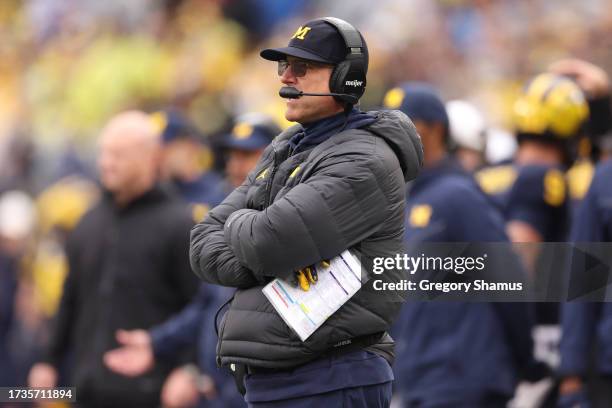 Head coach Jim Harbaugh looks on in the first half while playing the Indiana Hoosiers at Michigan Stadium on October 14, 2023 in Ann Arbor, Michigan.