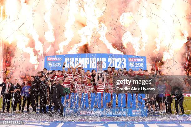 Liam Farrell of Wigan Warriors lifts Betfred Super League Grand Final trophy during the Betfred Super League Final match between Wigan Warriors v...